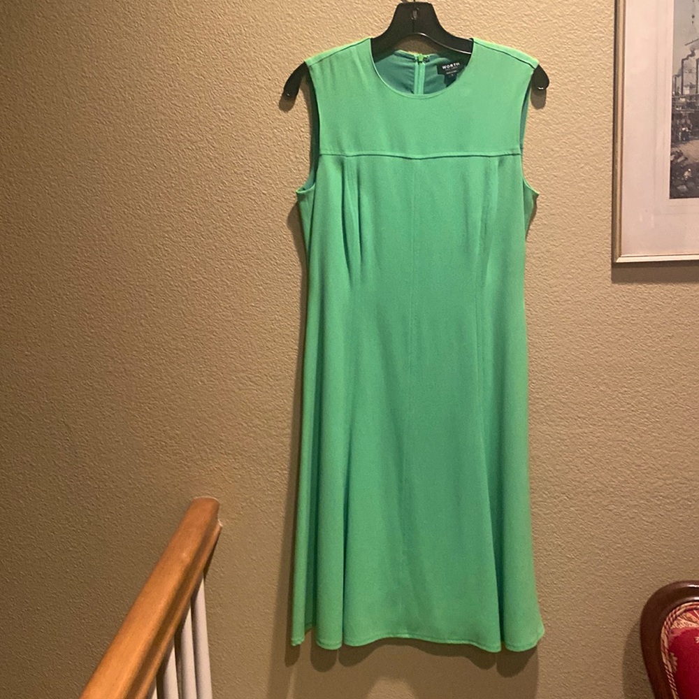 Spring green fitted flare dress below knee. Cap sleeve